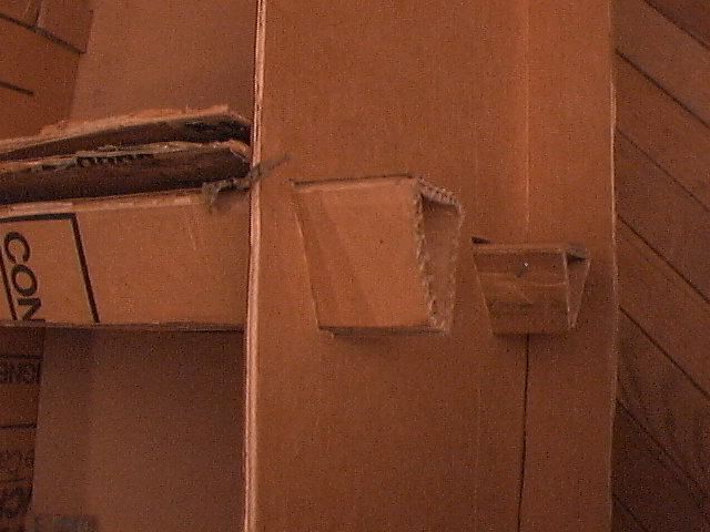 Detail of chair showing side, seat and both beams. 